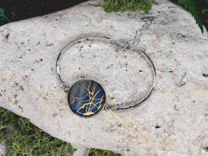 Steel bracelet with abstract cabochon