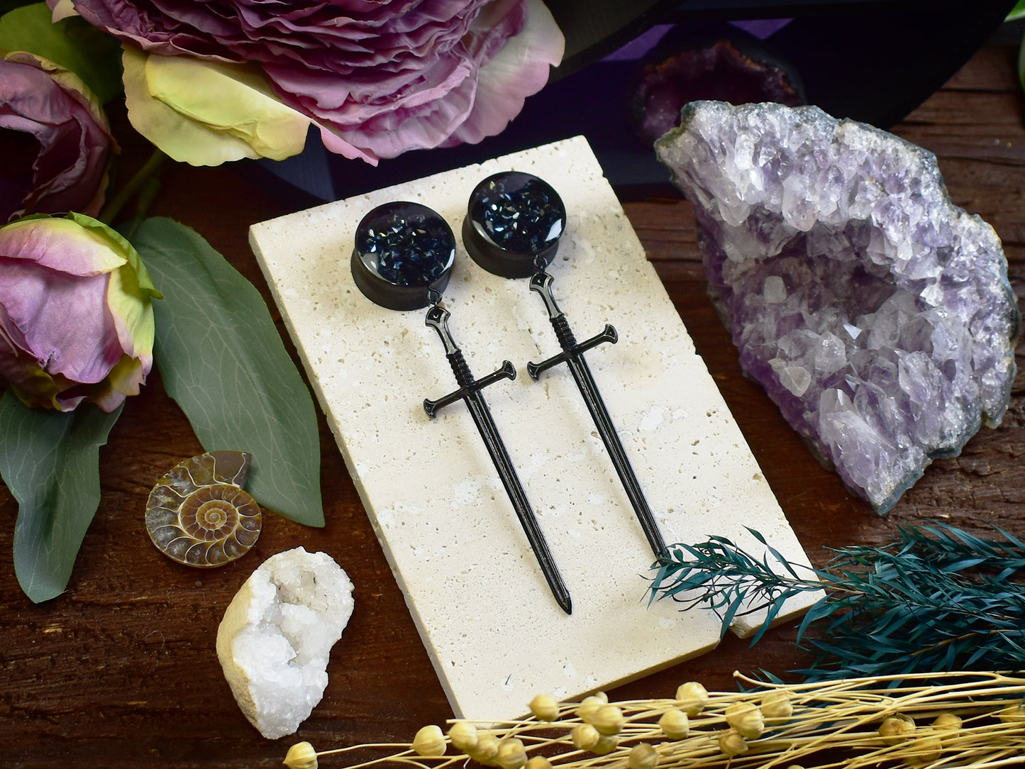 ear plugs with black sword pendant and subtle black rhinestone details, comfortable for daily wear