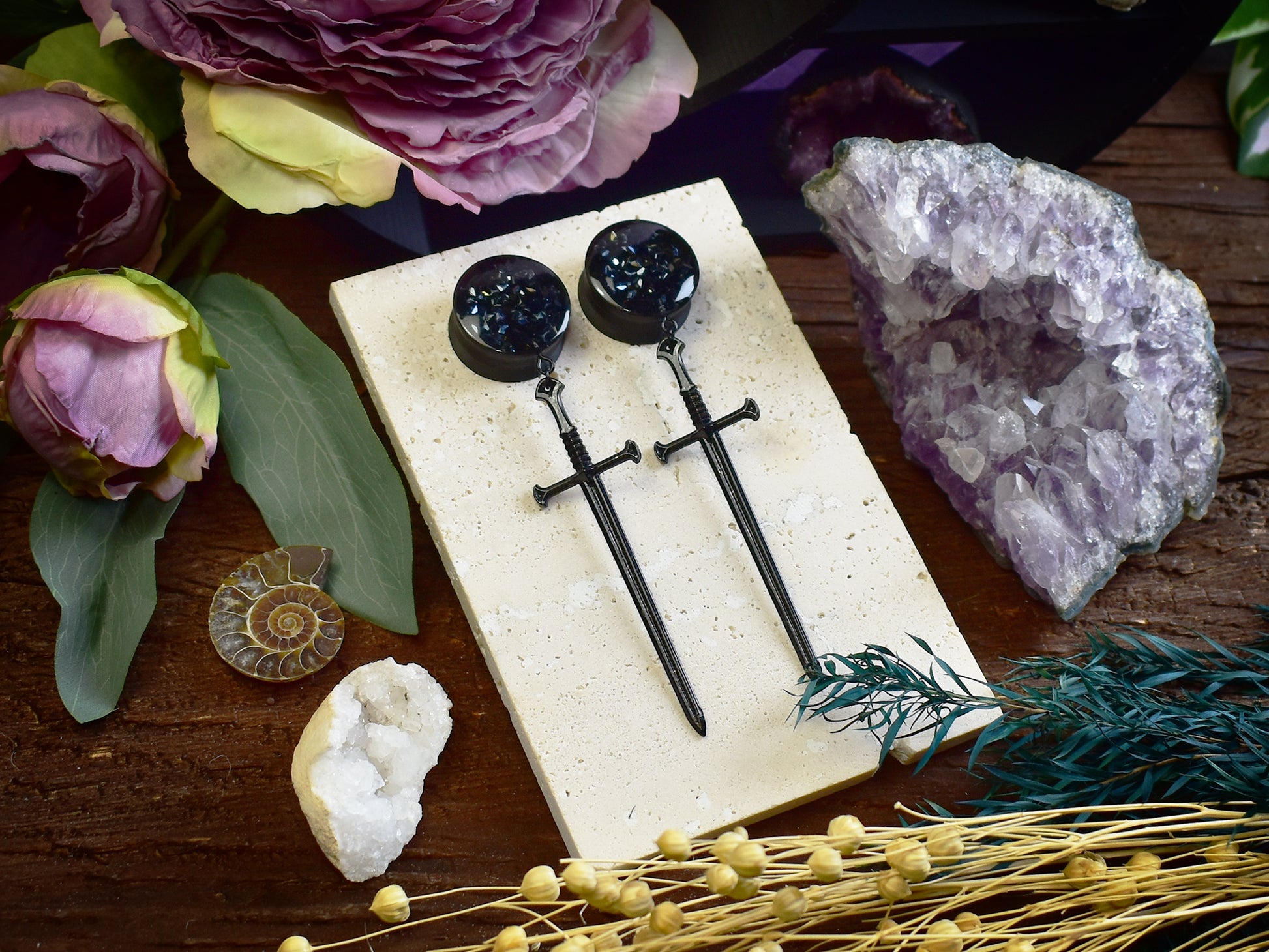  ear tunnels with black sword design, black resin finish and sparkling rhinestones