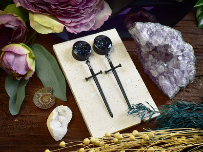  ear tunnels with black sword design, black resin finish and sparkling rhinestones