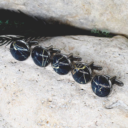 Gemelos negros con patrón de piedra