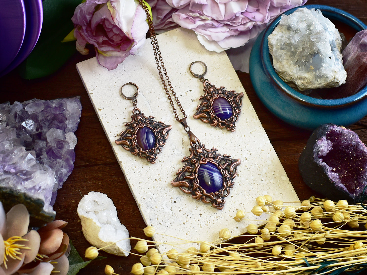 Close-up of purple banded agate copper earrings showing natural stone patterns and Victorian electroformed metalwork