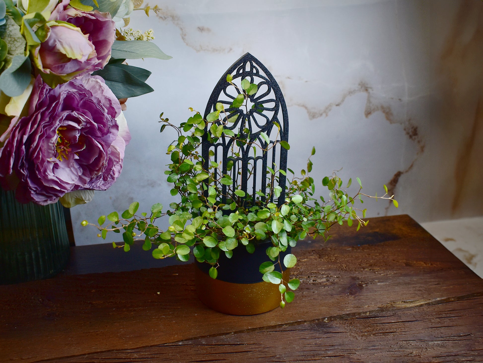 plant support for gothic interior decor with rosette design